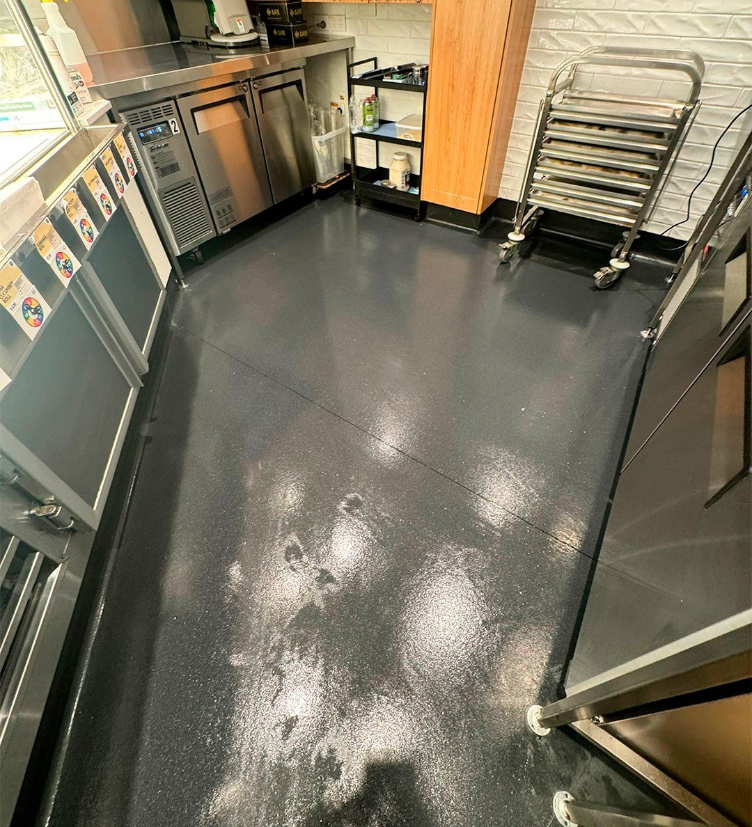 Commercial kitchen floor freshly cleaned by Gold Keys on the Gold Coast