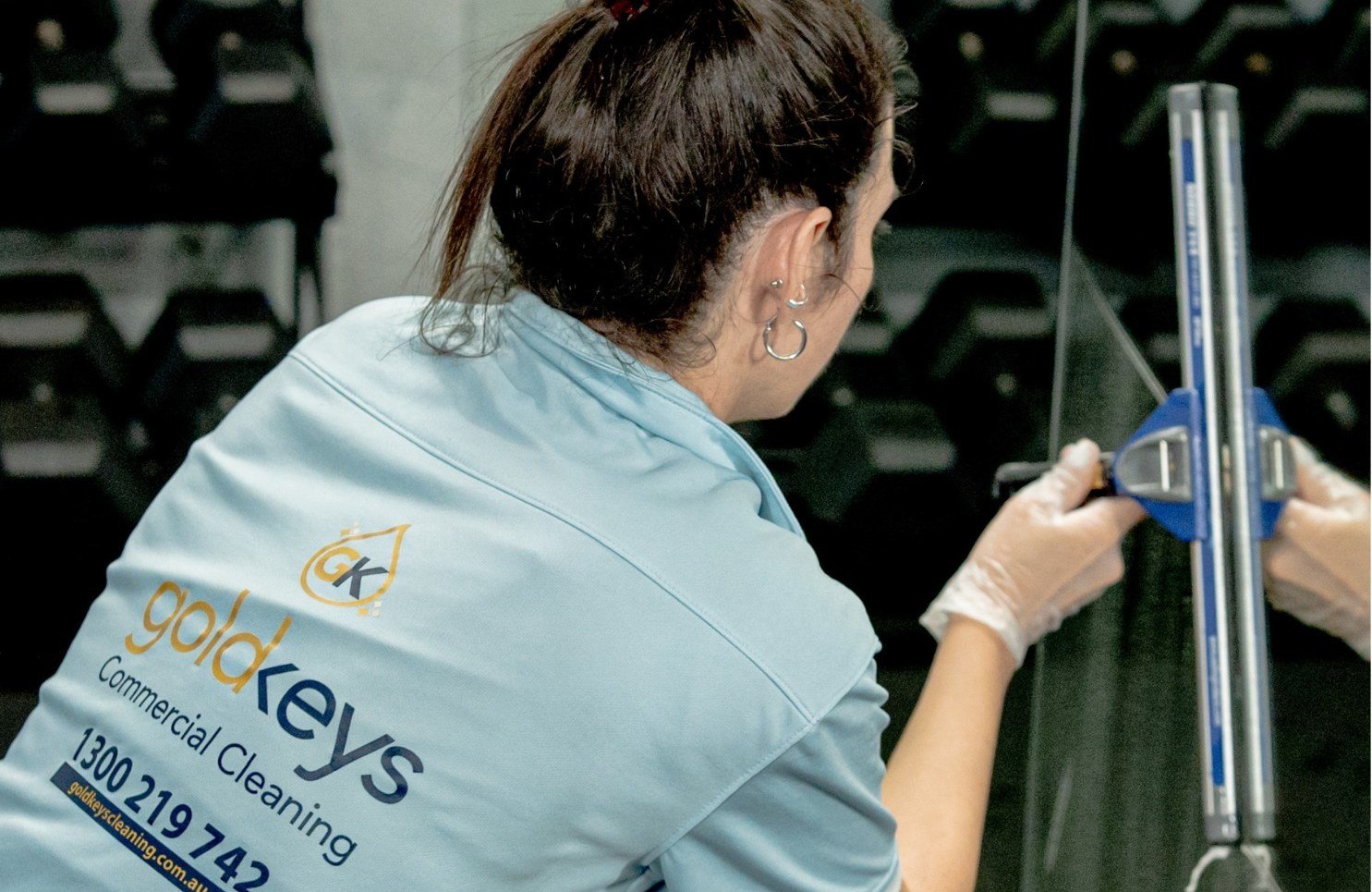 Gold Keys cleaner removing smudges from gym mirrors and glass on the Gold Coast