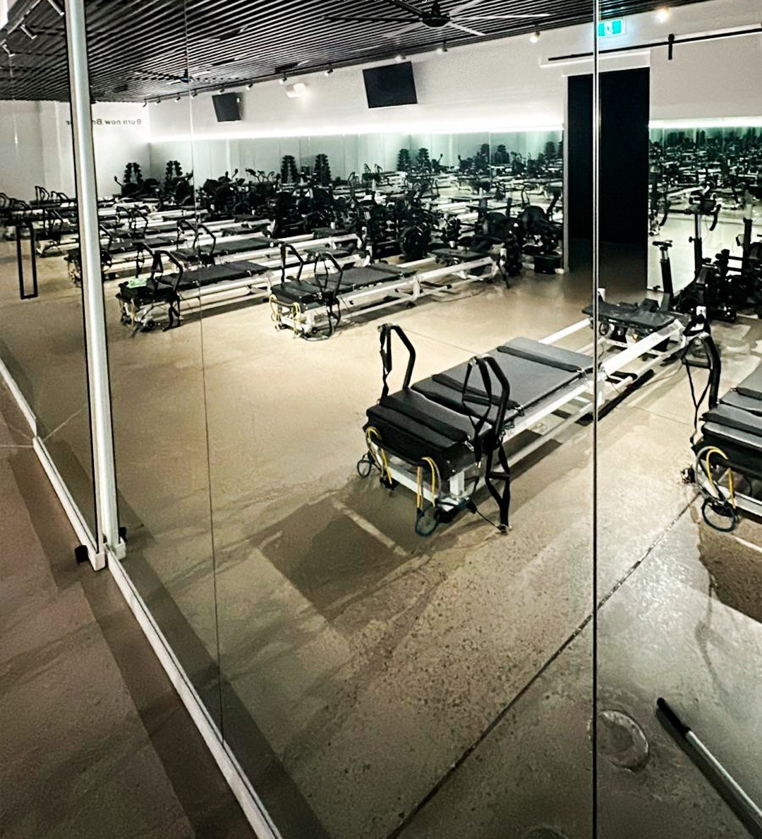 Clean pilates studio with reformer beds after a Gold Keys commercial clean on the Gold Coast