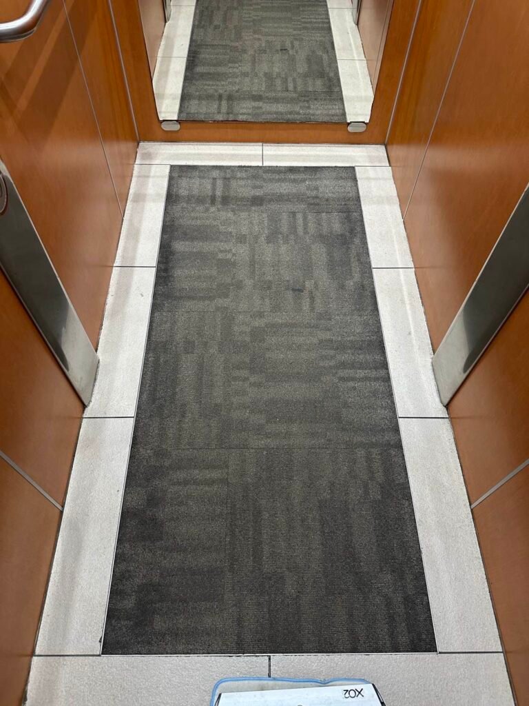 Clean lift floor and stainless steel in a Gold Coast strata building