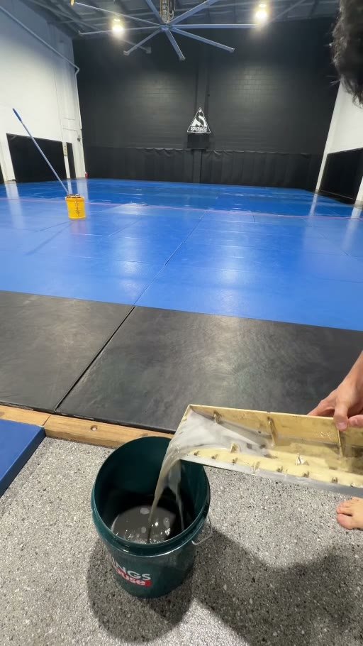 Dirty water extracted from martial arts mats during a deep clean on the Gold Coast